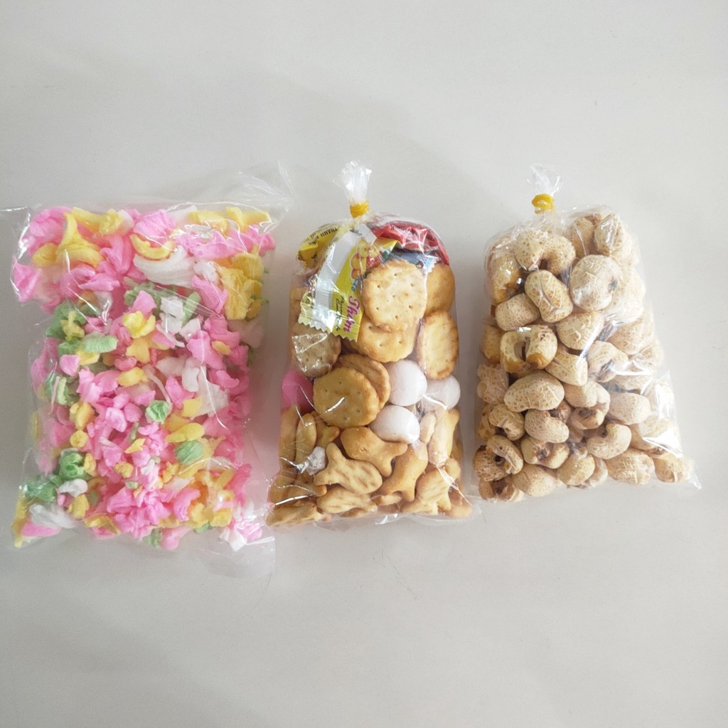Bánh kẹo cúng gói , bỏng ngô, bánh huệ. - thờ cúng