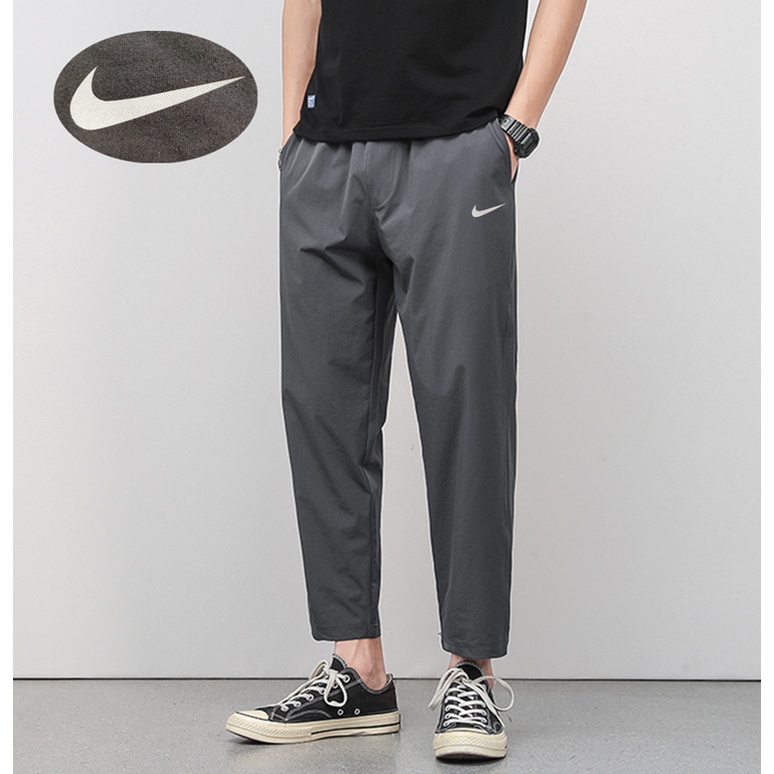Quần Thể Thao Nike 100% Chính Hãng In Logo Phản Quang Chất Liệu Nylon Co Giãn Tốt Thời Trang Cho Nam Và Nữ