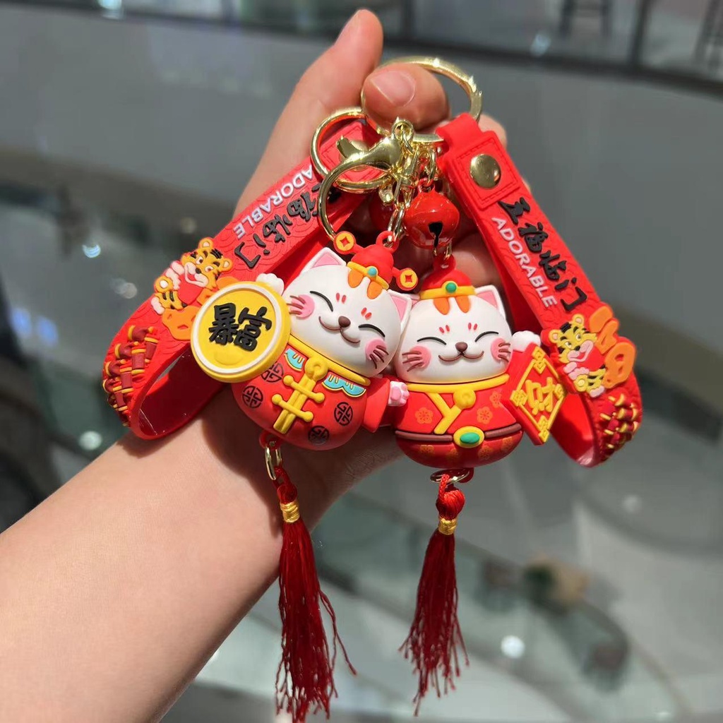 Năm mới quốc triều Nafu móc khóa dễ thương hoạt hình may mắn mèo búp bê tua mặt dây chuyền xe hơi bán