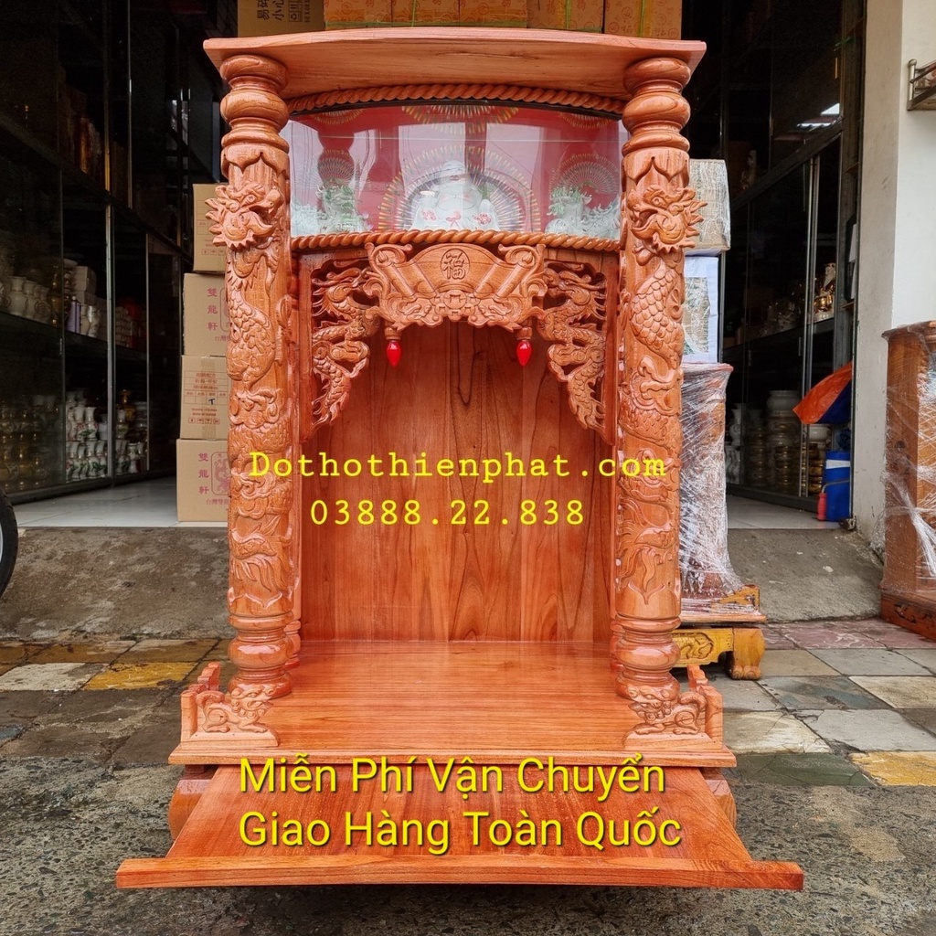 Bàn thờ thần tài ông địa gỗ xoan quỳ trụ điện tử ngang 68cm mẫu mới rất đẹp