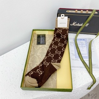 Tất gucci gối