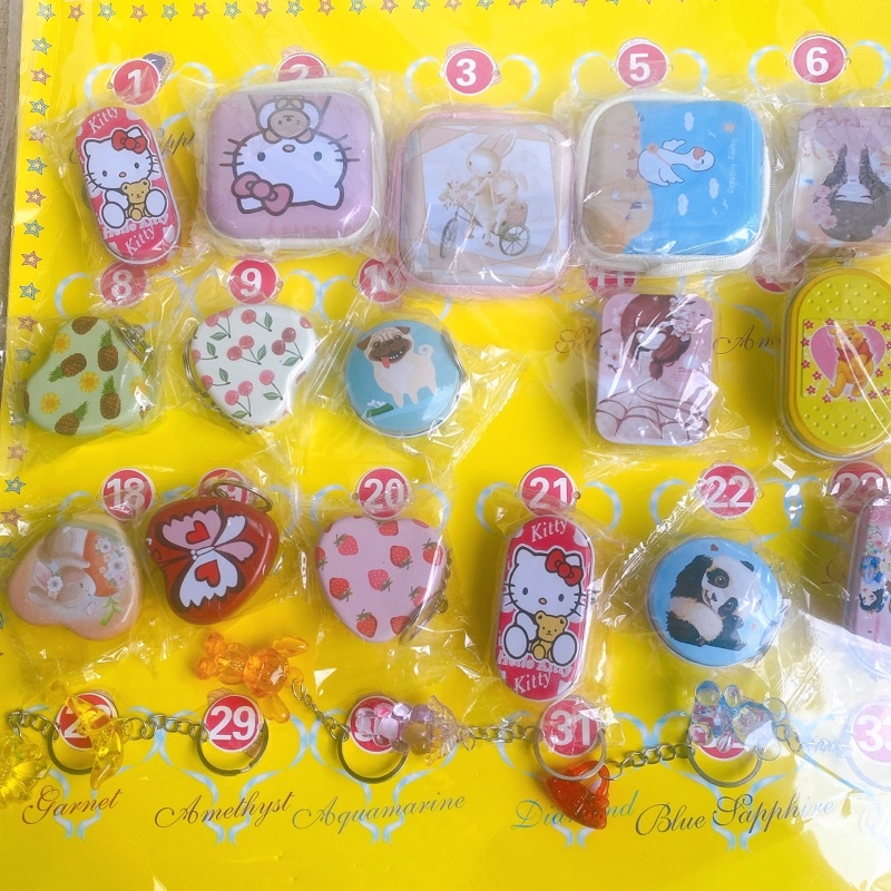 Vỉ 22 cái móc khoá nhiều hình 144 tem rút thưởng