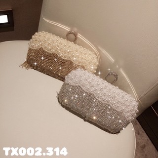 Túi clutch ngọc đính đá tua rua