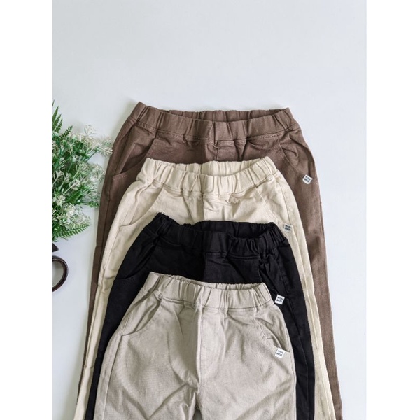 Quần dài kaki Petite túi xéo trai gái