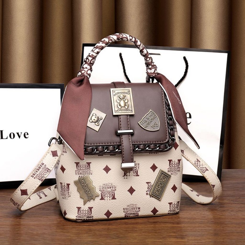 Hot backpack hot backpack women's bag new casual shoulder messenger bag large capacity badge small backpack dual-purpose bag