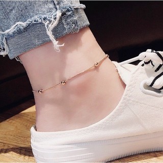 Lắc chân titan mì bi
