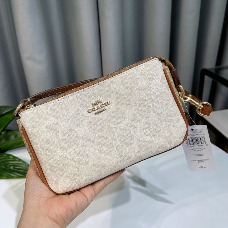 Túi Coac*h Nolita 19 kẹp nách sang trọng