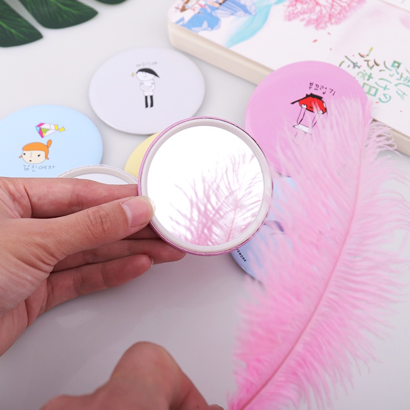 Gương trang điểm mini cầm tay
