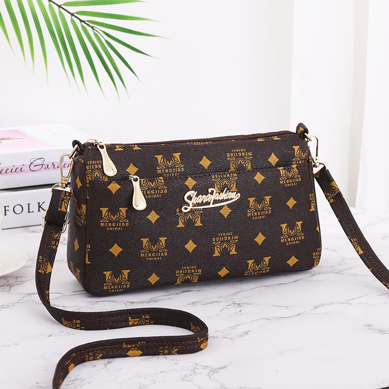 Túi xách nữ đeo chéo Quảng Châu họa tiết kiểu Retro dễ phối đồ, mang đi chơi, size 24cm
