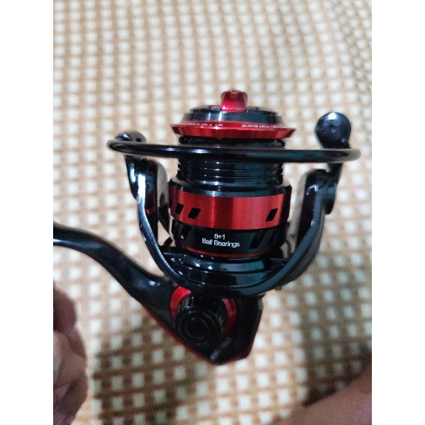 Máy câu lure cối nông size 1000, cối kim loại và tay quay kim loại