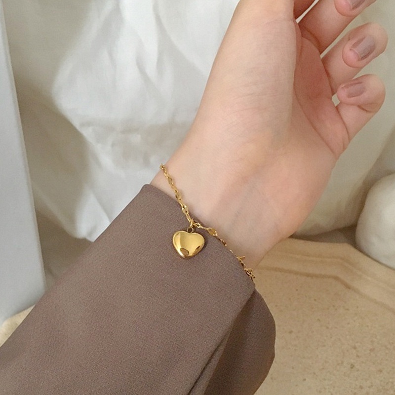 Lắc tay titan không gỉ mạ vàng 18k mặt hình trái tim xinh xắn dễ thương dành cho nữ