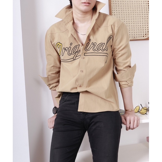 Sơ mi thêu chữ trước form suông rộng Nô Store