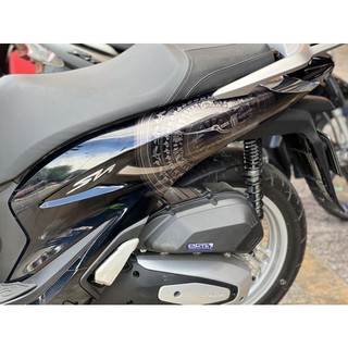 Tem trống đồng Sh