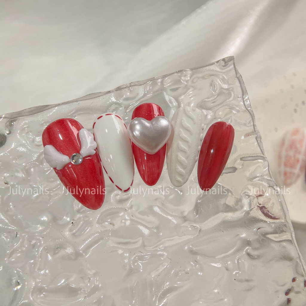 Móng úp thiết kế Nb205 phong cách Giáng sinh, ông già Noel, bông tuyết đỏ trắng julynails.vn