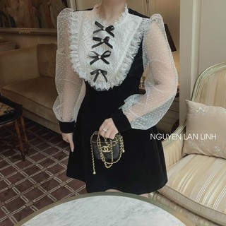 Váy đầm nhung phối ren nơ cổ.