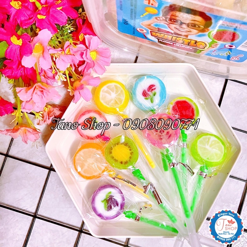 Một que kẹo mút hình trái cây sắc màu cho bé, ăn vặt ngon rẻ TaNo