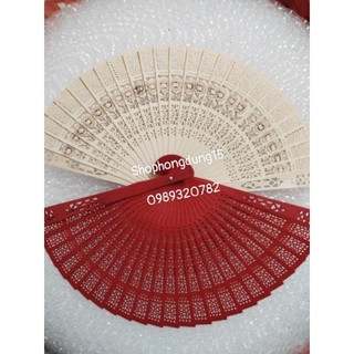 Quạt gỗ xếp trang trí tháp oản....
