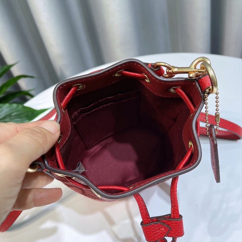 Túi xách tay C0ach bucket màu đỏ đô