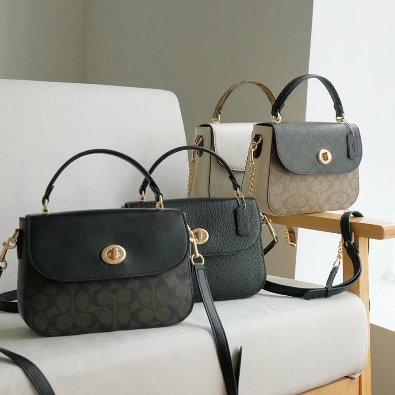 Túi Coach nắp gập