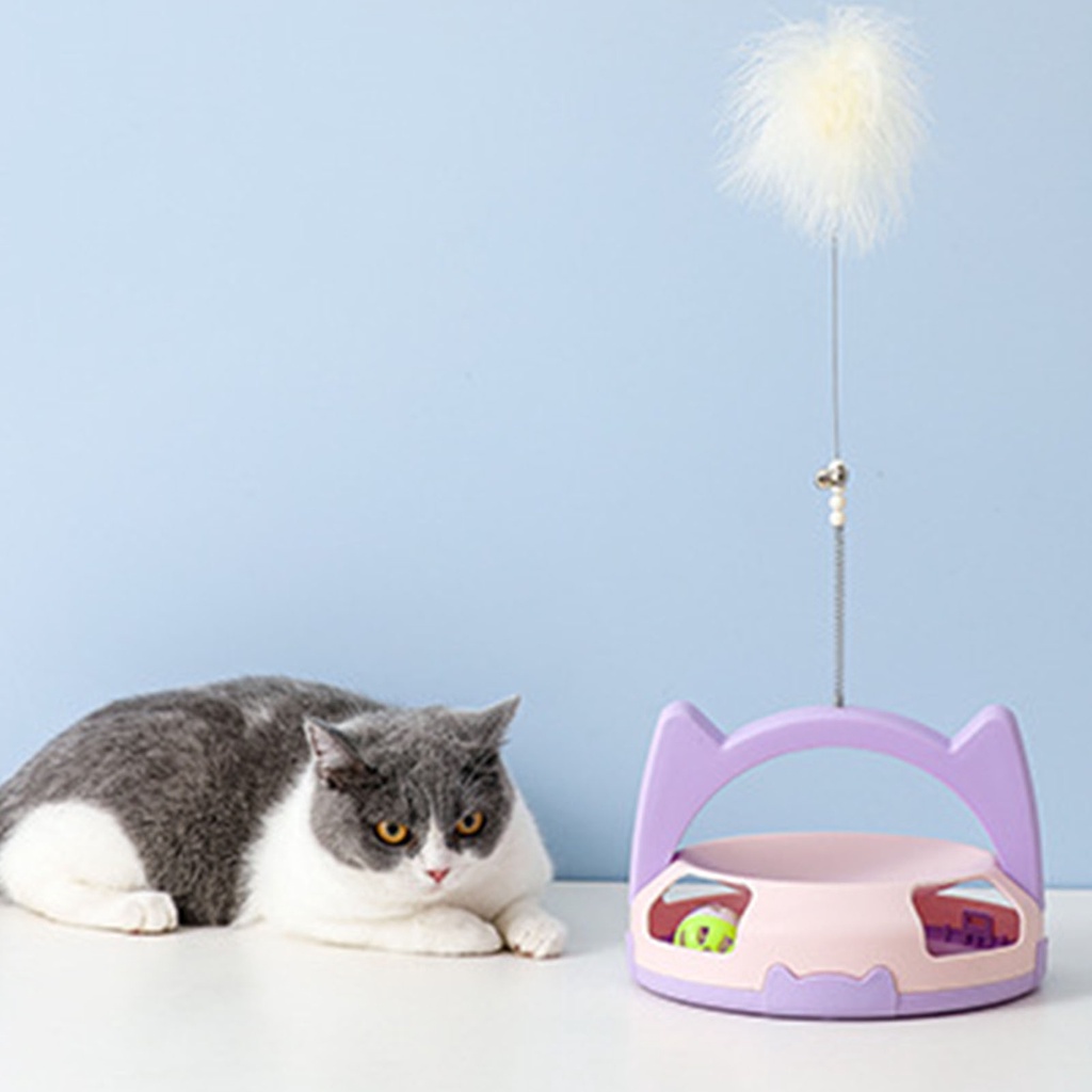 Elsabell. Tháp bóng lăn bàn xoay  gắn thanh lông vũ thích hợp làm bài tập cho mèo vận động