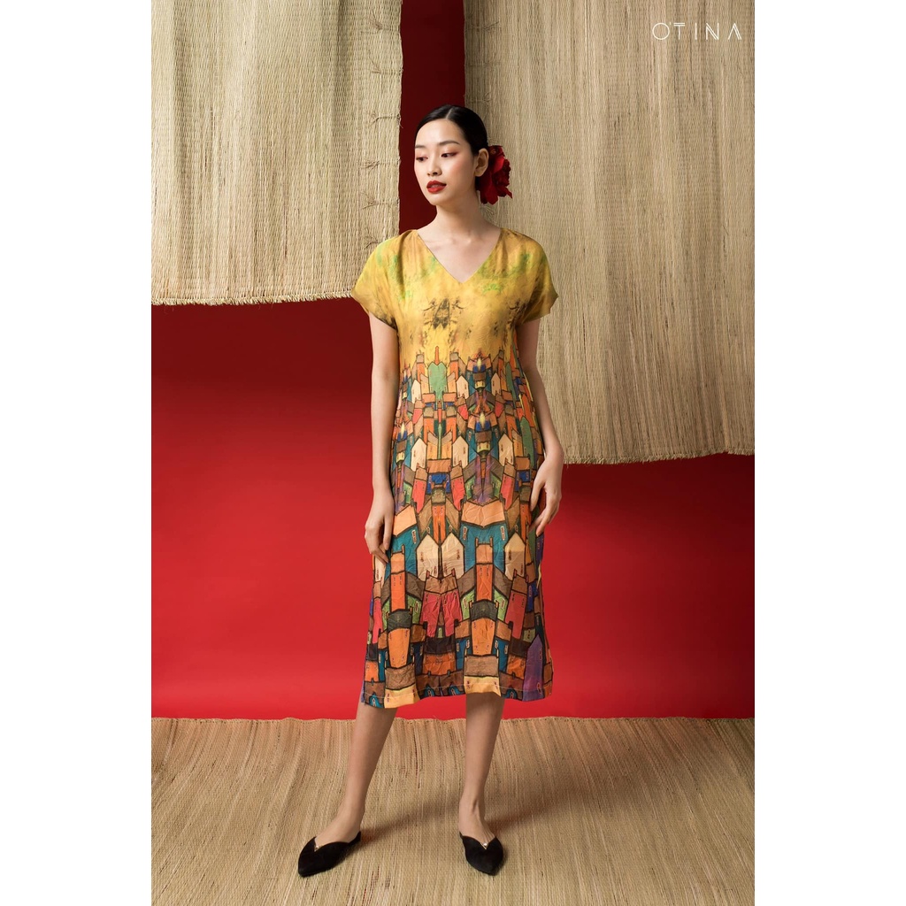 Đầm lụa vàng phố
