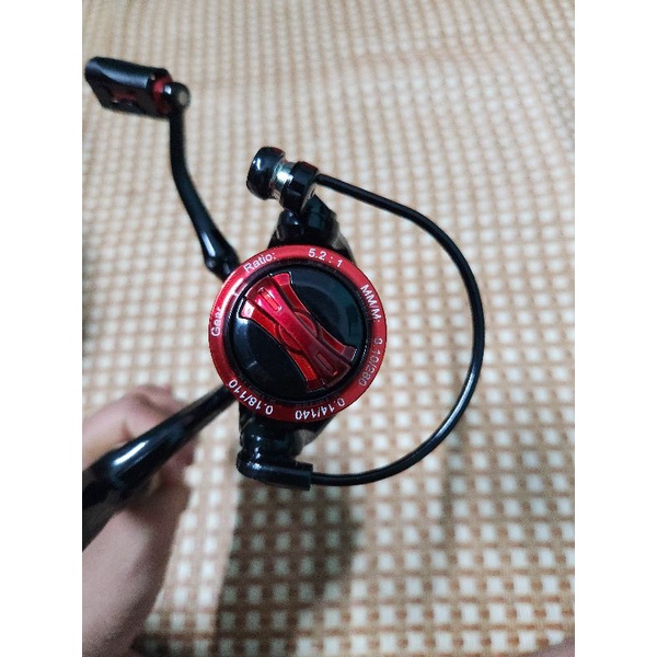 Máy câu lure cối nông size 1000, cối kim loại và tay quay kim loại