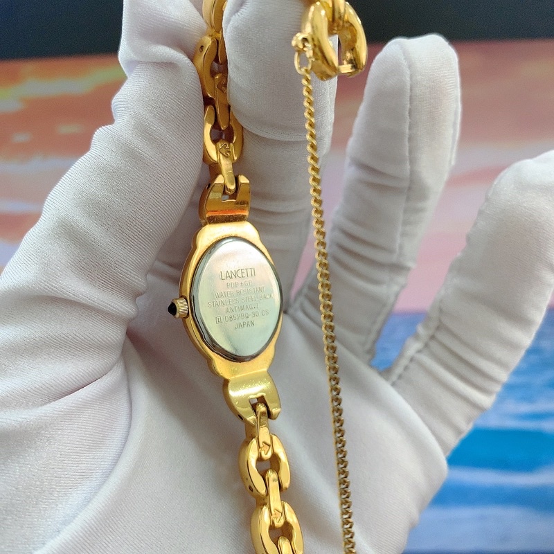 Đồng hồ si nữ hiệu Lancetti Milano, máy Nhật dáng lắc vàng, đính đá