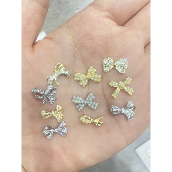 Sét charm kim loại nơ siêu xinh ( miễn ship )