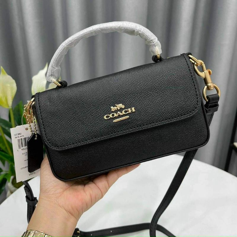 túi coach mini mới sang trọng,chất liệu da thật vân sần rất bền bỉ, xách tay hoặc đeo chéo đều xinh. Phom dáng chuẩn xịn