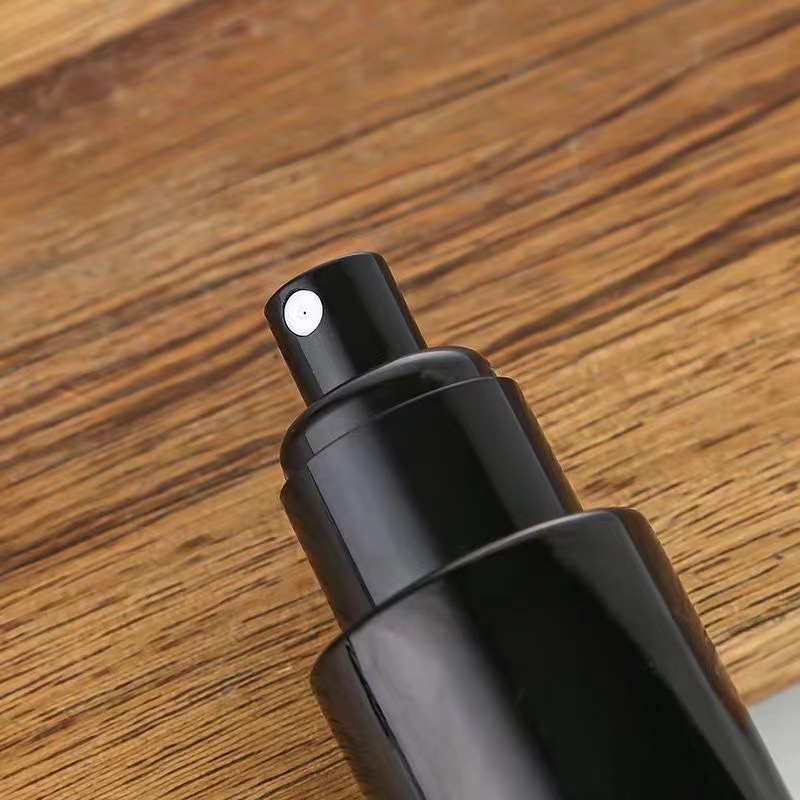 Bình Xịt Thủy Tinh Màu Đen Đựng Mỹ Phẩm Khi Đi Du Lịch
