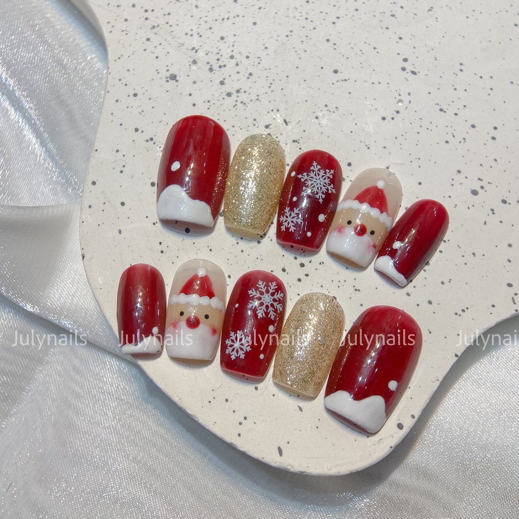 Móng úp thiết kế Nb205 phong cách Giáng sinh, ông già Noel, bông tuyết đỏ trắng julynails.vn