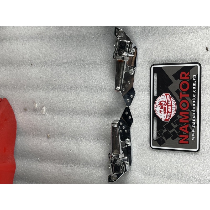 Gạt để chân xe điện Xmen