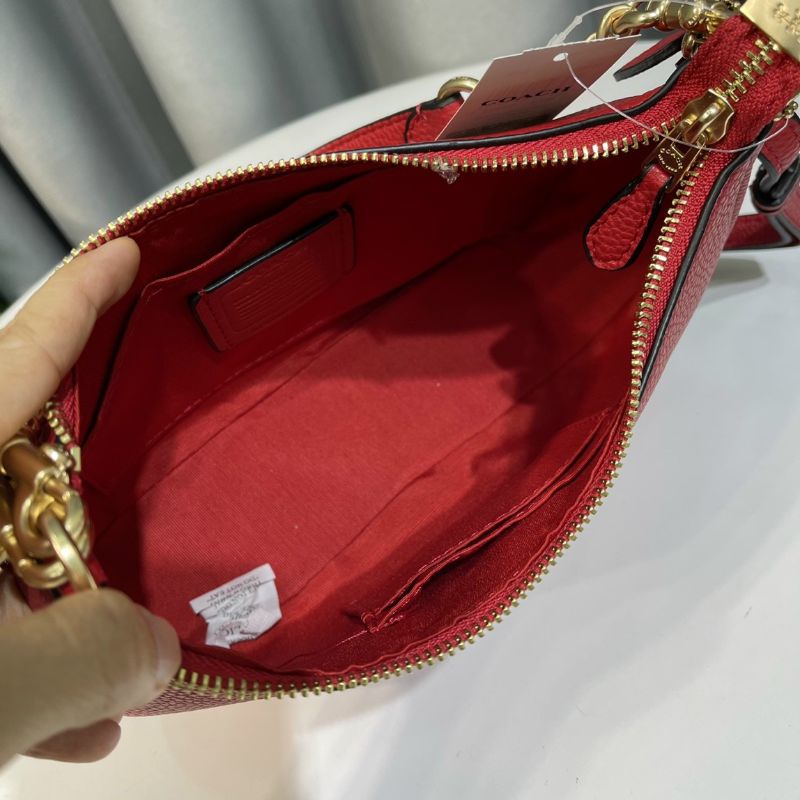 Túi Coa**ch Teri dáng thuyền da thật sang chảnh