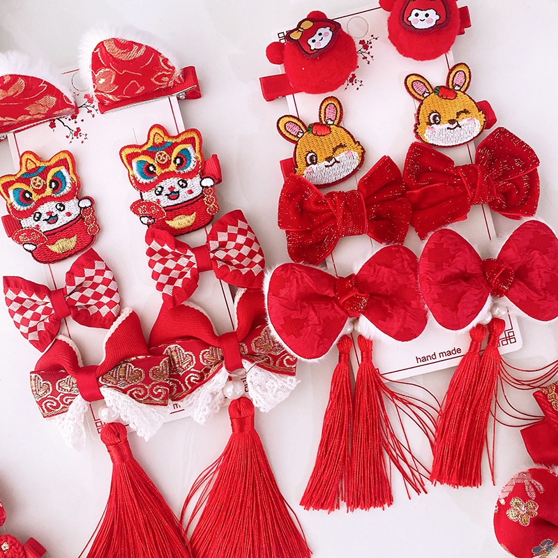 Set 8 Kẹp Tóc Nơ Vải Màu Đỏ Phối Tua Rua Phong Cách Năm Mới Cho Bé Gái