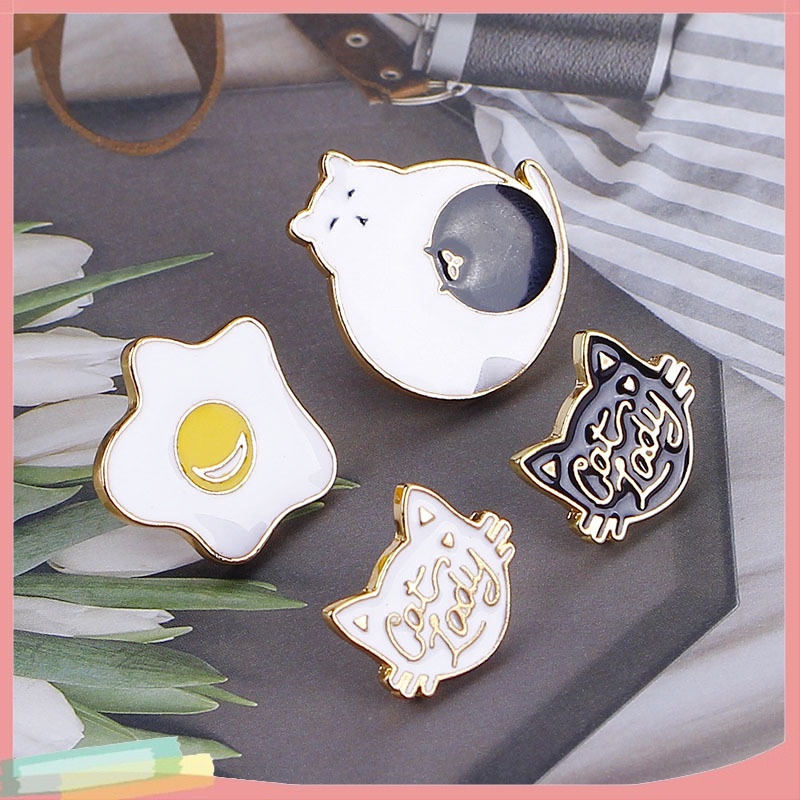 Ghim cài áo hình mèo và quả trứng sáng tạo