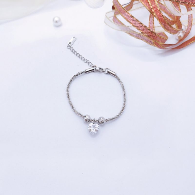 Lắc tay nữ inox xỏ bi mặt trái tim sáng đẹp không không gỉ sét