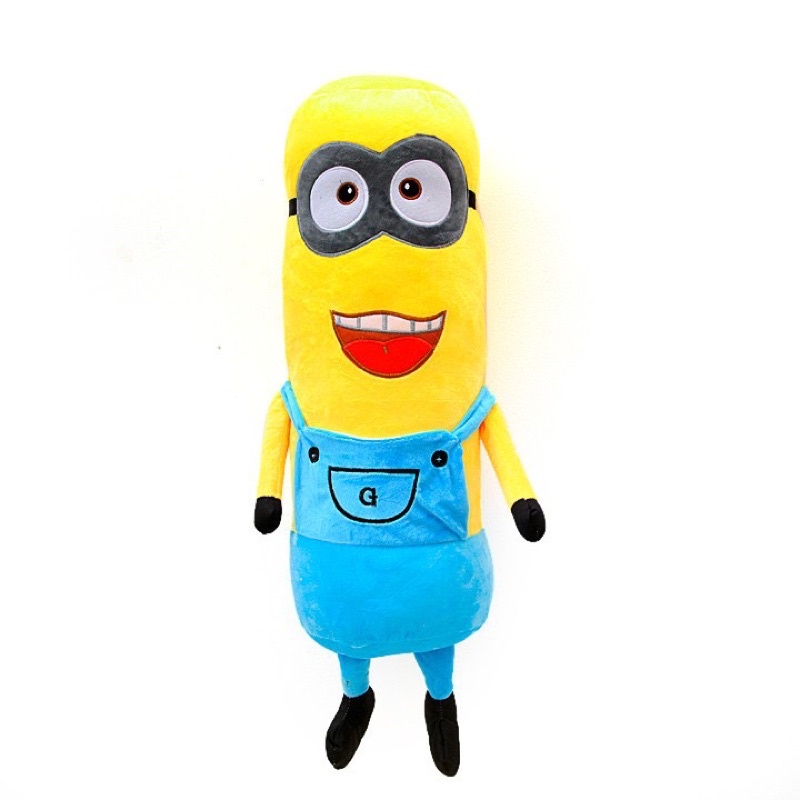 Gối ôm minion. Gấu bông Minion mặt cười ngộ nghĩnh, được thiết kế dạng dài để bé ôm ngủ rất thích