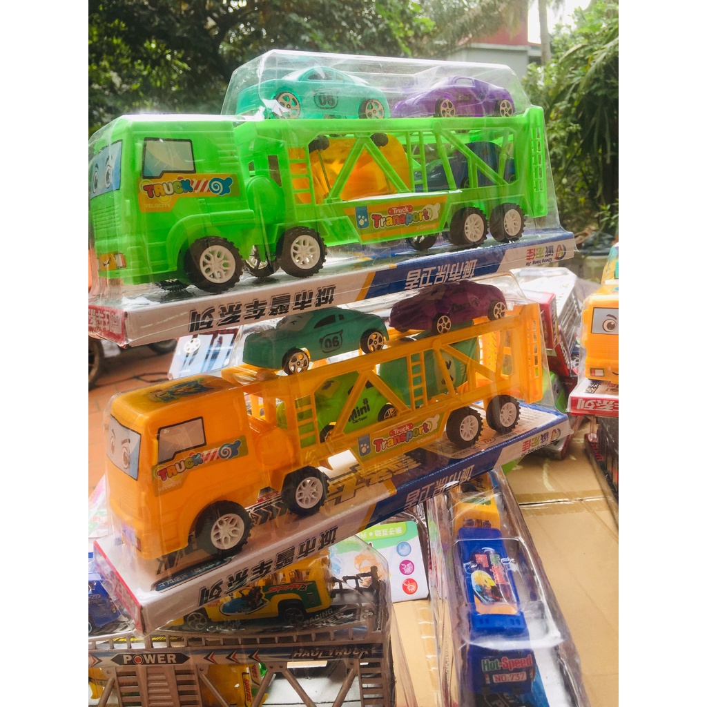 Đồ chơi xe tải đầu kéo 2 tầng chở 4 xe con