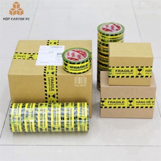 Băng Dính Logo (Vàng) In Chữ HÀNG DỄ VỠ XIN NHẸ TAY/Băng Keo Hàng Dễ Vỡ Cảnh Báo Vận Chuyển 250g