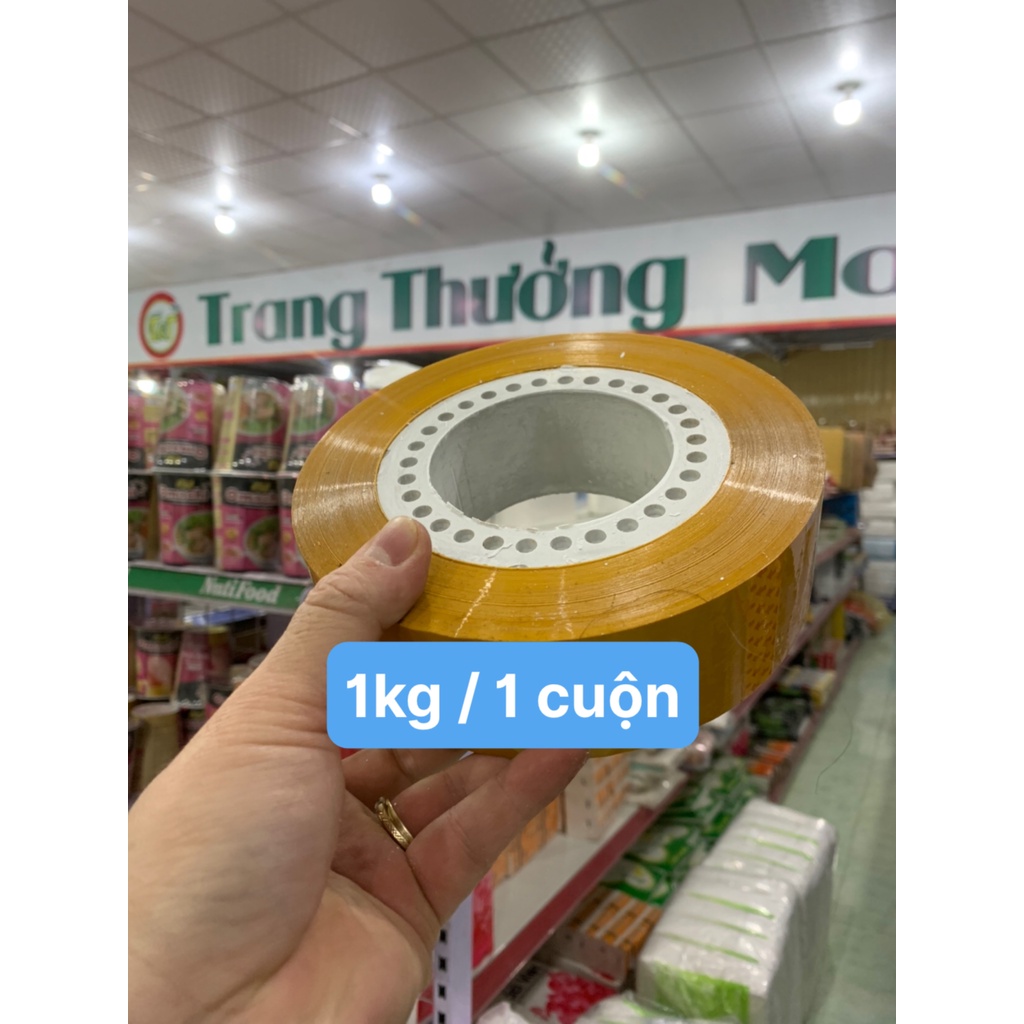 Cuộn băng dính đóng hàng đục, trong siz 5cm x 1kg ( Loại lõi mỏng - 3mm)