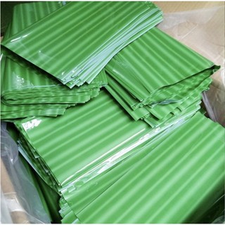 Lá chuối gói nem chua, chả lụa, bánh chưng