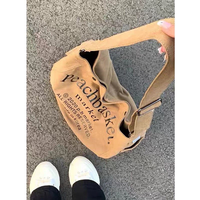 Túi đeo vai đeo chéo vải canvas phong cách cá tính street style