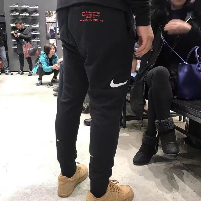 Nk nam giới móc đôi thêu quần bó sát dệt kim thông thường quần thể thao cj4881