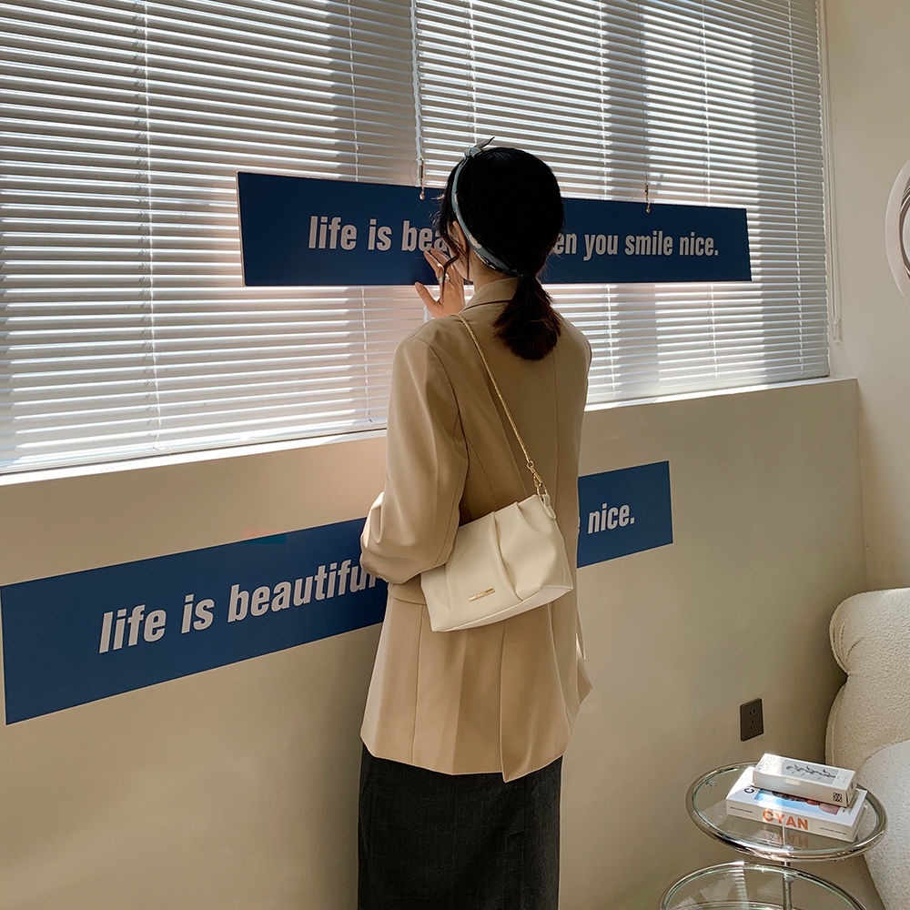 Túi Xách Đeo Vai Phong Cách Niche Thiết Kế Mới Cao Cấp Kết Cấu Bánh Bao Có Dây Xích Dành Cho Bạn Nữ