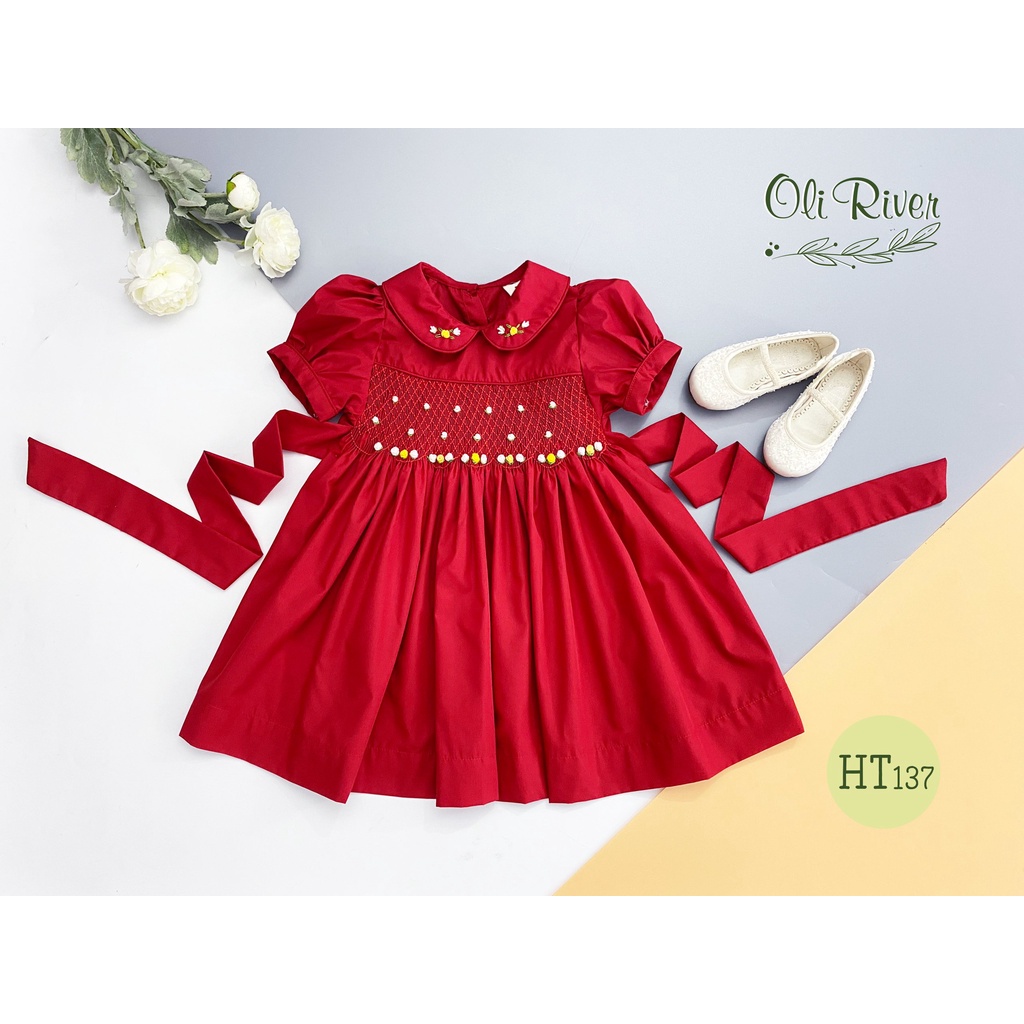 Váy Smock bé gái Oli River Kid tay bồng cổ sen thêu hoa vàng trên nền vải đỏ chất liệu thô cho bé từ 1 - 7 tuổi - HT137