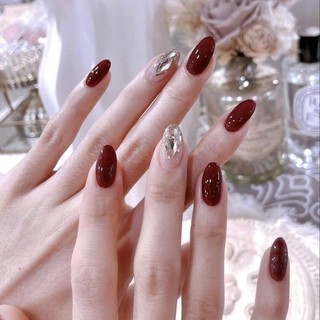 Nail box thiết kế sơn gel đỏ nail tết vô cùng tôn da nail đính đá