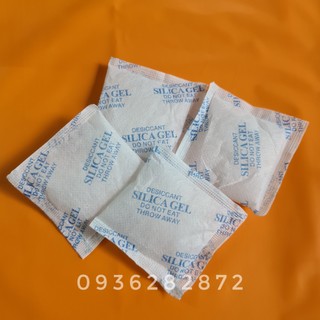 Gói hút ẩm, túi hút ẩm (1Kg). Dùng bảo quản quần áo, giày dép, thực phẩm khô. Gói Silicagel, không độc hại