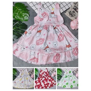 Đầm gấm xước bé