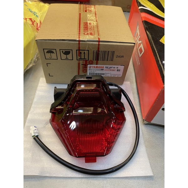 Đèn lái Ex150 zin hãng