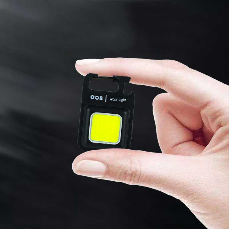 Đèn Pin LED COB Mini Bỏ Túi Hình Nút Bần Có Thể Sạc Lại Tiện Dụng